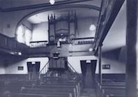 Interior, with the pipe organ prominent.